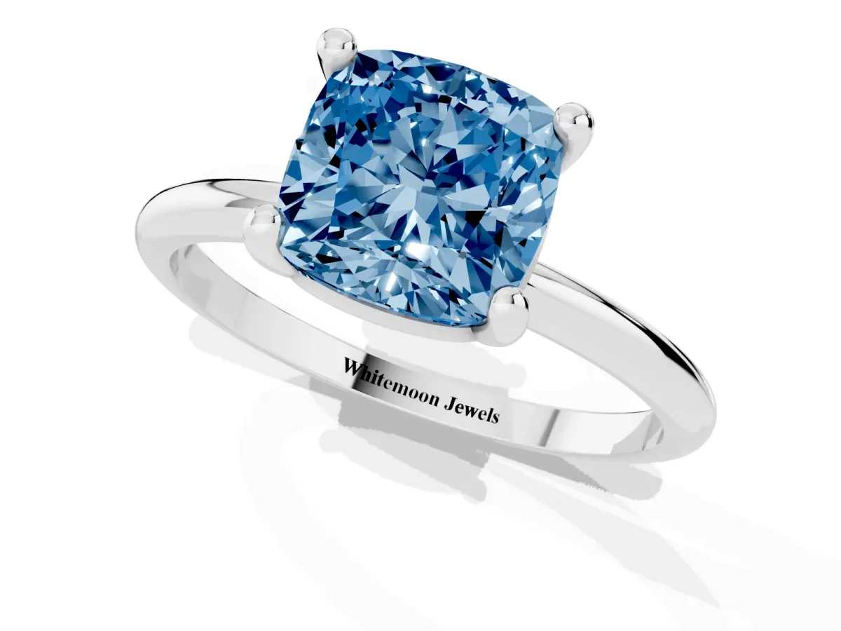 Fancy Blue Cushion Cut Solitaire Diamond Ring with 4-Prong Setting on a Classic Band Silver