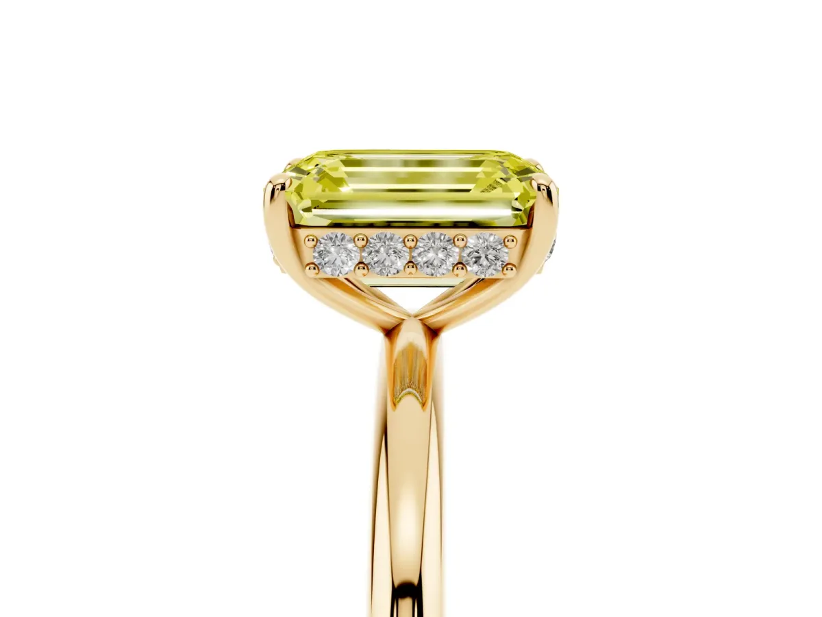 Fancy Yellow Emerald Cut Solitaire Diamond Ring with a Classic Band and Four-Prong Setting Yellow gold