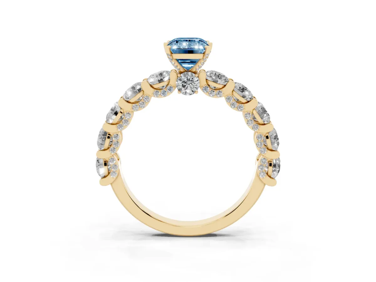 Fancy Blue Emerald Cut Diamond Side Stone Engagement Ring with Four-Prong Setting Yellow gold