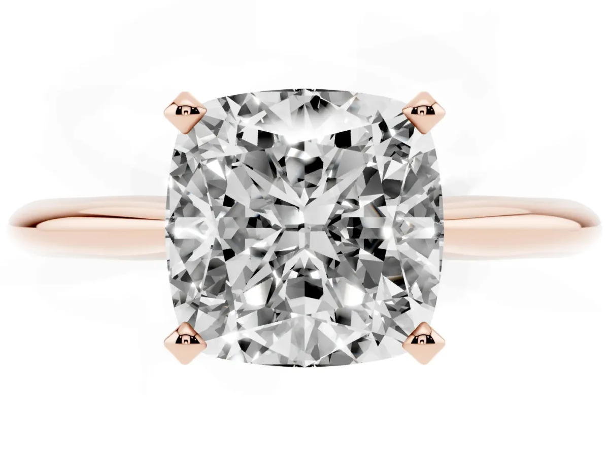 Cushion Cut Cut Solitaire Ring with Four-Prong Setting on a Classic Band Rose gold