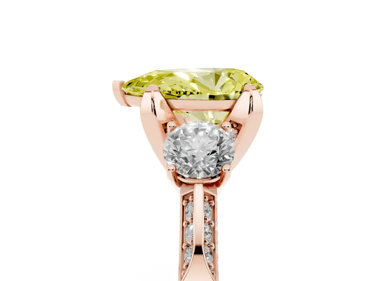 Fancy Yellow Pear Cut Brilliant Three-Stone Diamond Ring with Pavé Band and Four-Prong Setting Rose gold