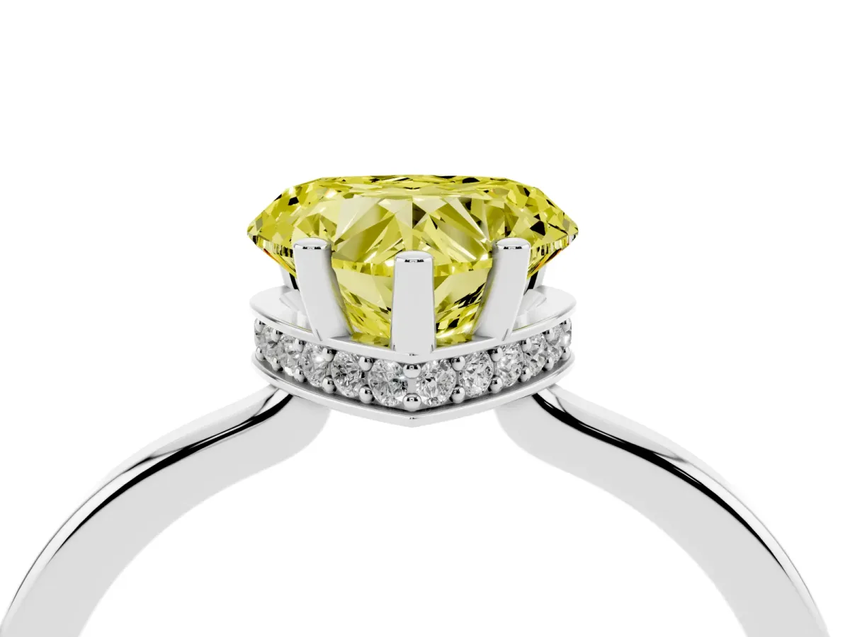 Fancy Yellow Heart Cut Cut Solitaire Engagement Ring with Four-Prong Setting on a Classic Band Silver