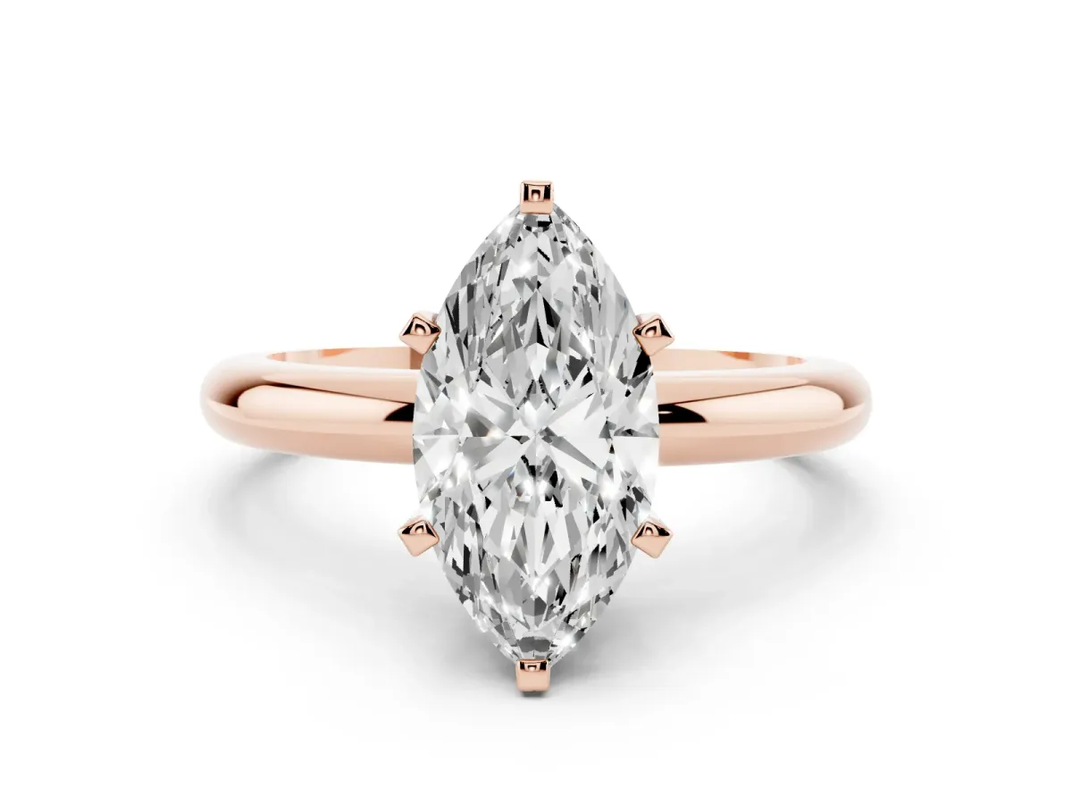 Marquise Cut Diamond Solitaire Engagement Ring with Round Band and Four-Prong Setting Rose gold