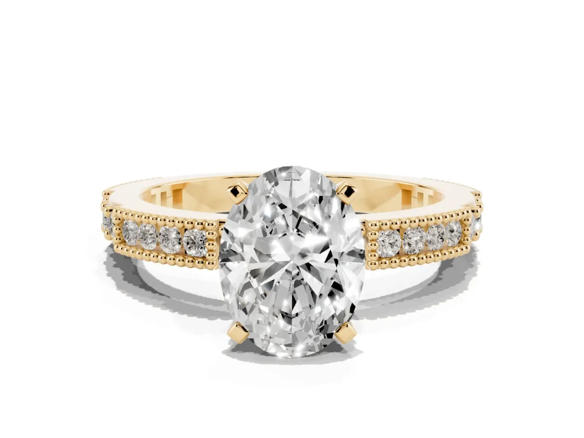 Oval Cut Solitaire with Pavé Band and Four-Prong Setting Yellow gold