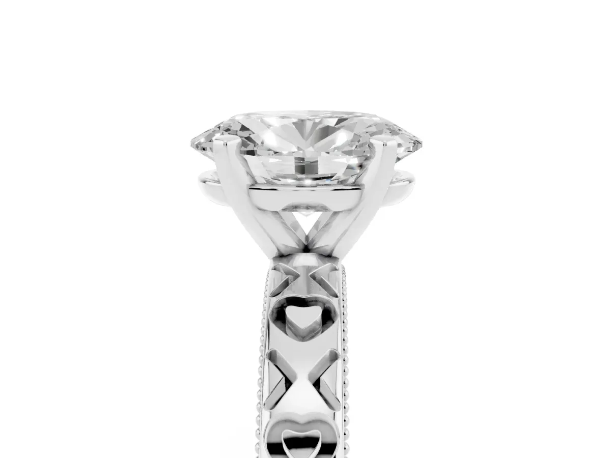 Oval Cut Solitaire Diamond Engagement Ring with XO Engraved Band and Four-Prong Setting Platinum