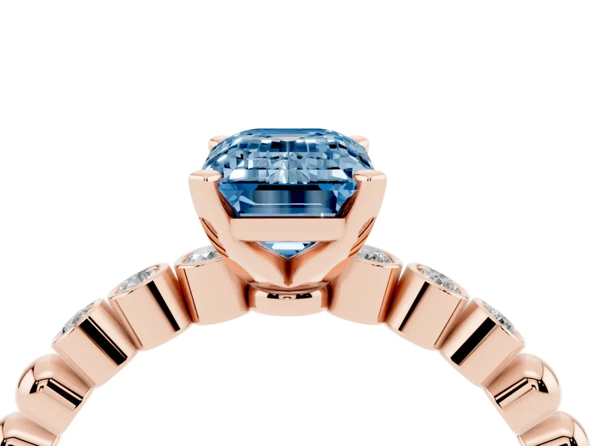 Fancy Blue Emerald Cut Solitaire Bezel Accent Diamond Engagement Ring with Beaded Band and Four-Prong Setting Rose gold