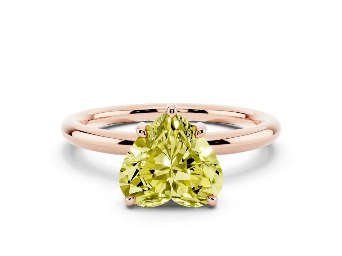 Fancy Yellow Heart Cut Solitaire Diamond Ring with Four-Prong Setting on a Plain Band Rose gold