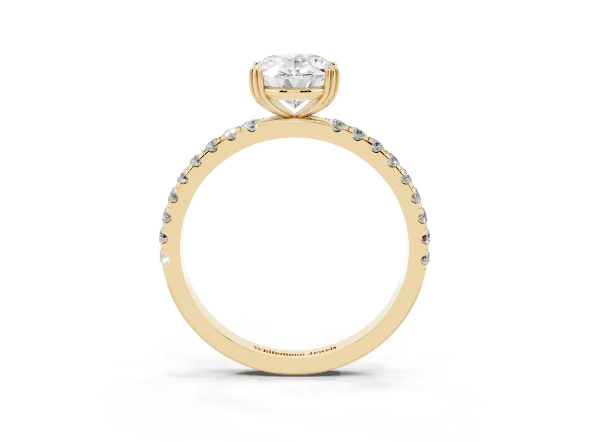 Oval Cut Brilliant Solitaire with Pavé Band and Claw Prong Setting Yellow gold