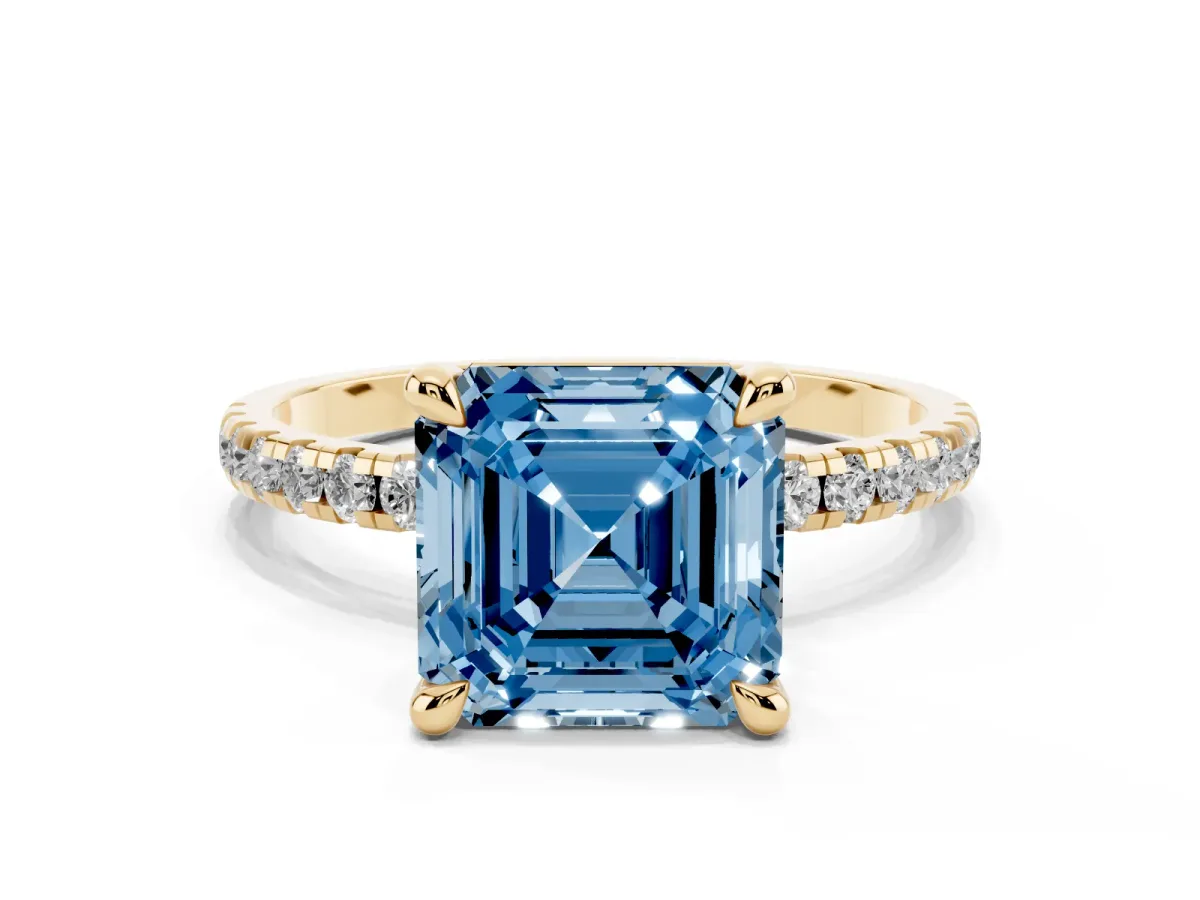 Fancy Blue Asscher Cut Diamond Brilliant Solitaire Ring with Pavé Band and Four-Prong Setting Yellow gold