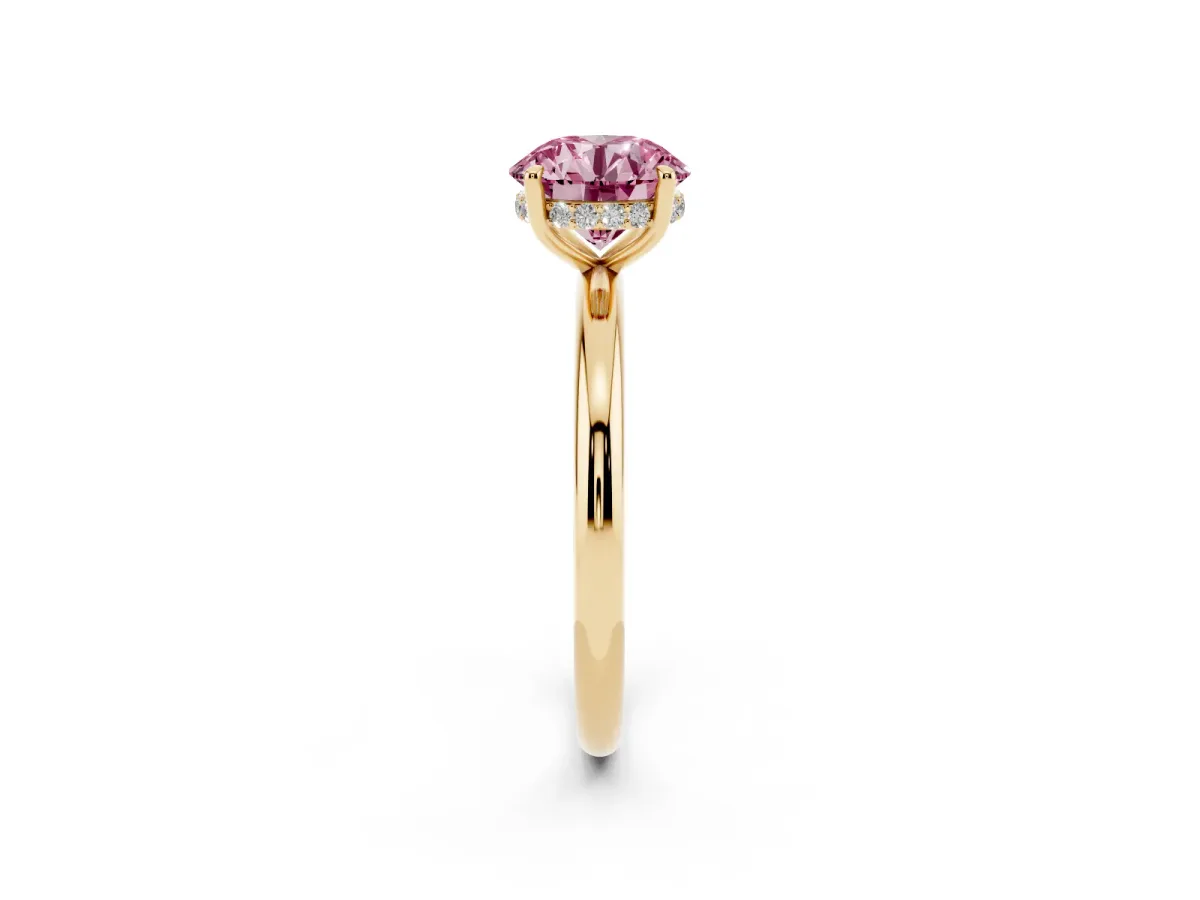 Fancy Pink Round Cut Diamond Solitaire Ring with Thin Band and Four-Prong Setting Yellow gold