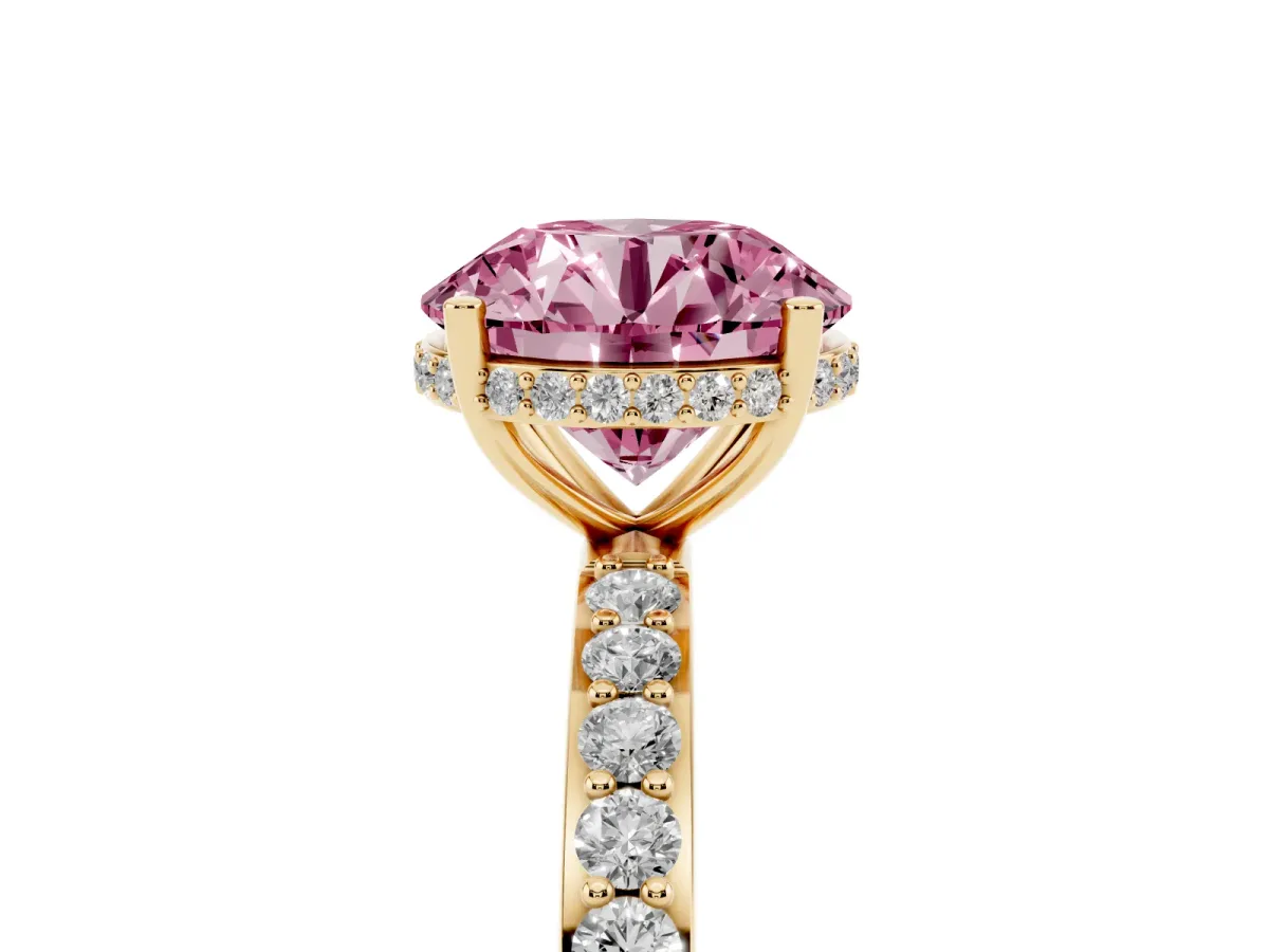 Fancy Pink Round Cut Diamond Solitaire Ring with Pavé Band and Hidden Halo Yellow gold