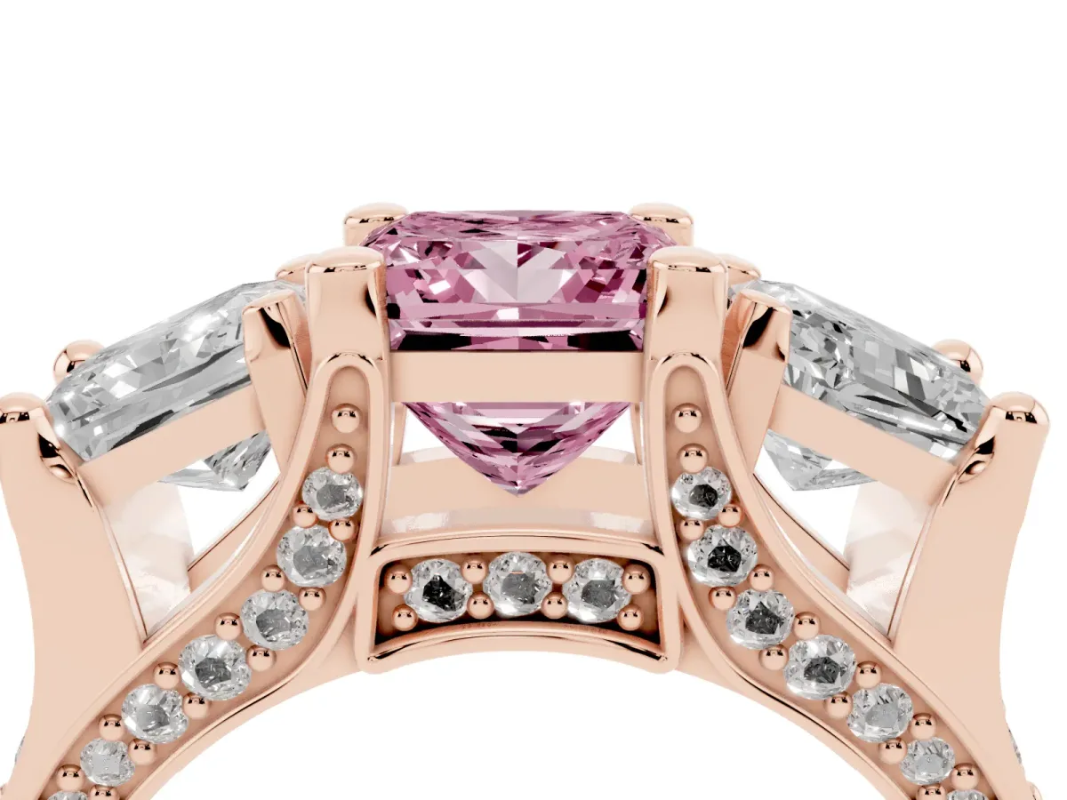 Fancy Pink Princess Cut Diamond Three-Stone Ring with Channel Set Band and Four-Prong Setting Rose gold