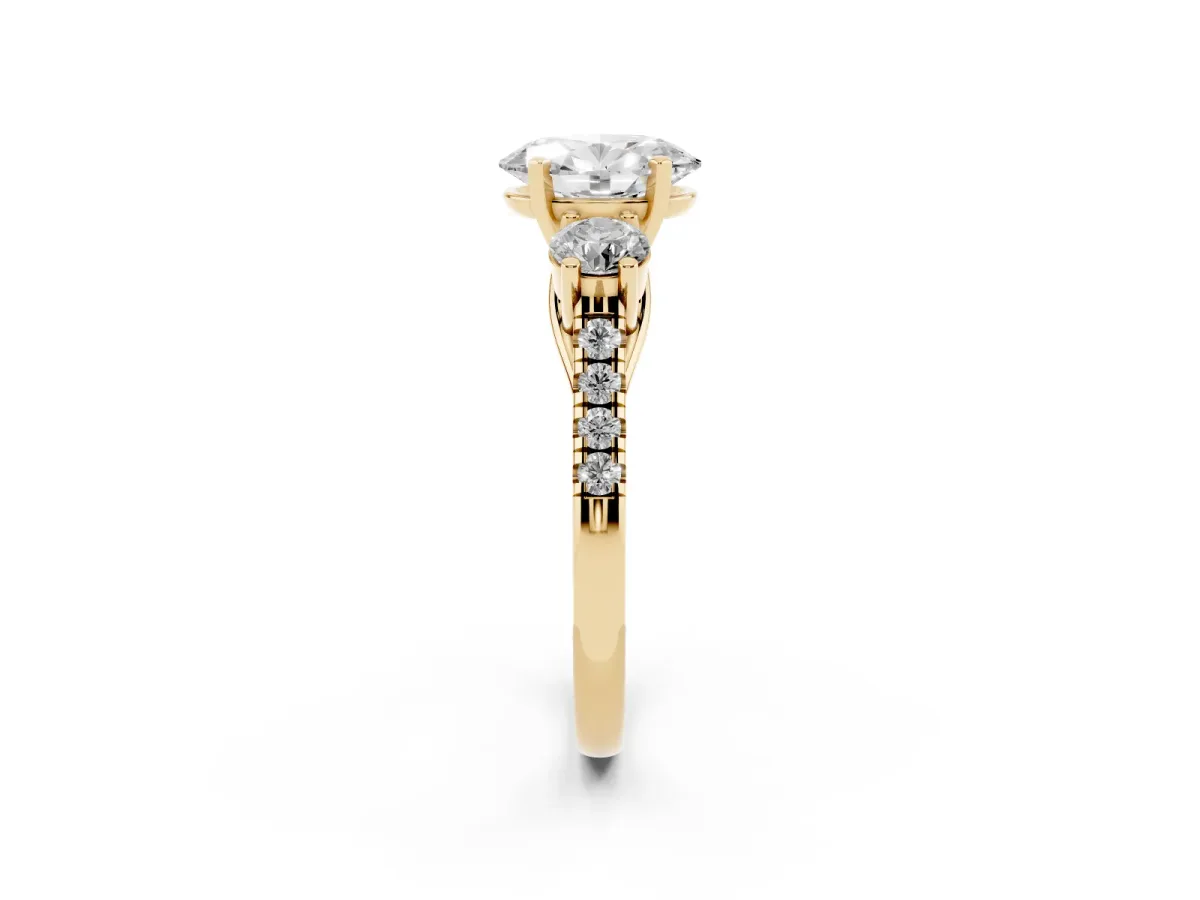 Three-Stone Oval Cut Diamond Pavé Band with Four-Prong Setting Yellow gold