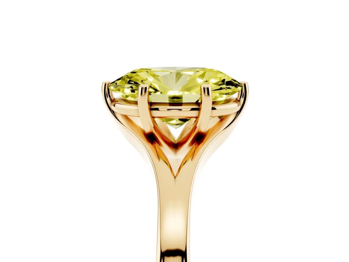 Fancy Yellow Oval Cut Solitaire Diamond Ring with Six-Prong Setting and Tapered Band Yellow gold