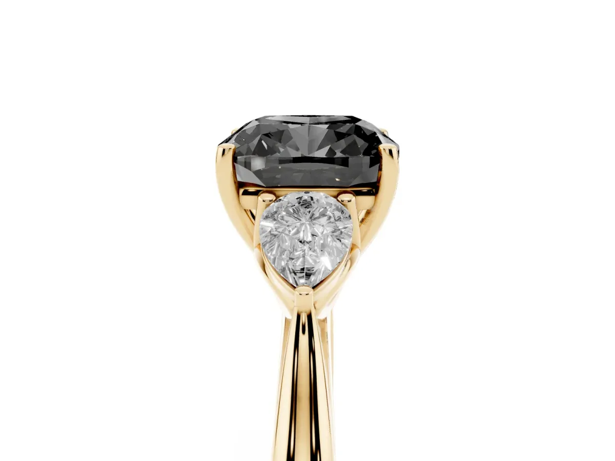 Fancy Black Cushion Cut Diamond Three-Stone Ring with Pear Side Stones and Prong Setting Yellow gold