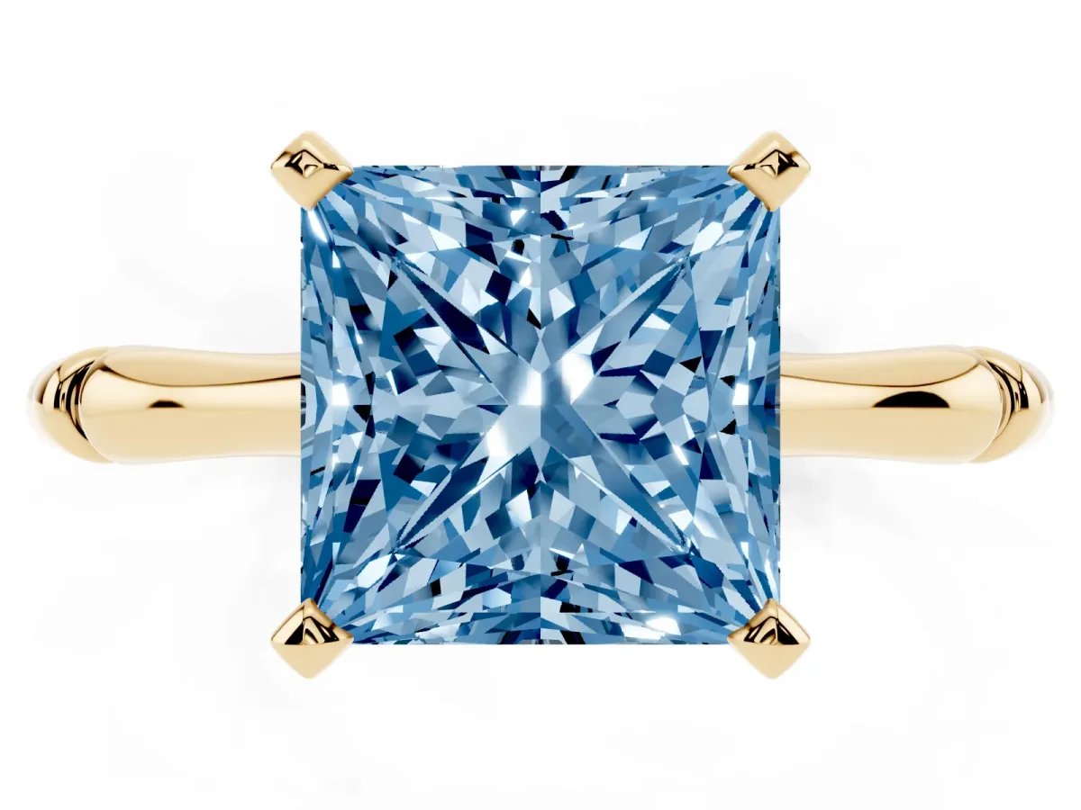Fancy Blue Princess Cut Solitaire Diamond Ring with Bamboo Band and Four-Prong Setting Yellow gold
