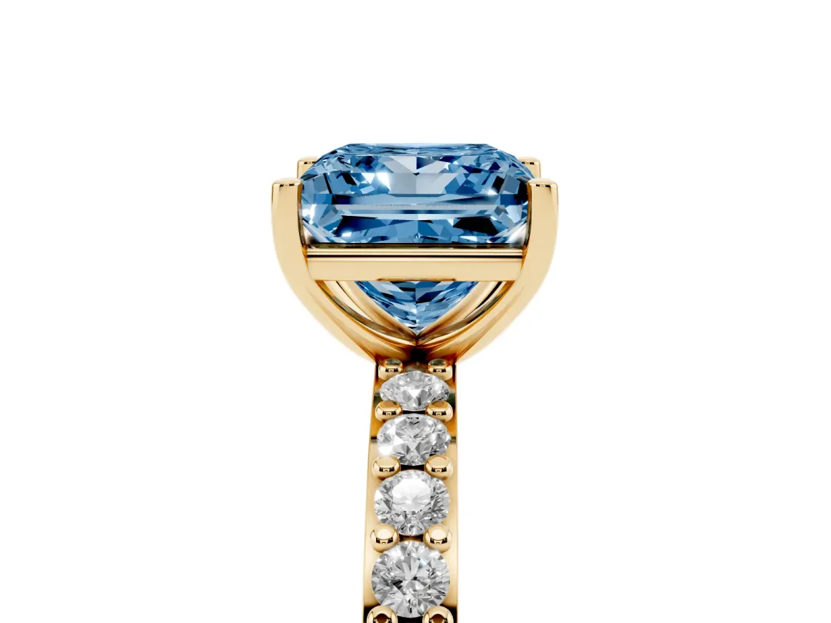 Fancy Blue Princess Cut Cut Diamond Solitaire with Pave Band and Four-Prong Setting Yellow gold