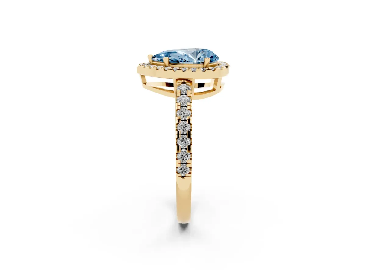 Fancy Blue Pear Cut Diamond Halo Ring with Pavé Band and Four-Prong Setting Yellow gold
