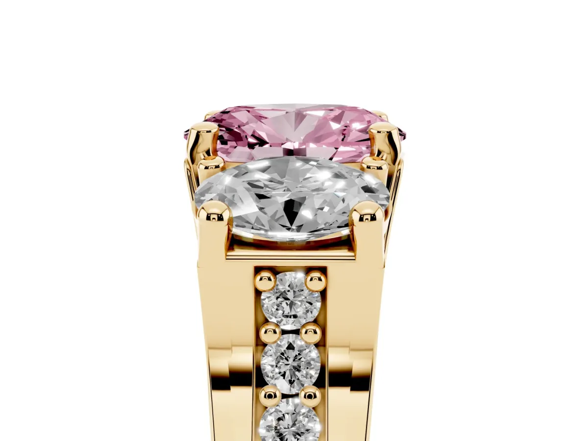 Fancy Pink Oval Cut Diamond Three-Stone Ring with Channel Set Band and Four-Prong Setting Yellow gold