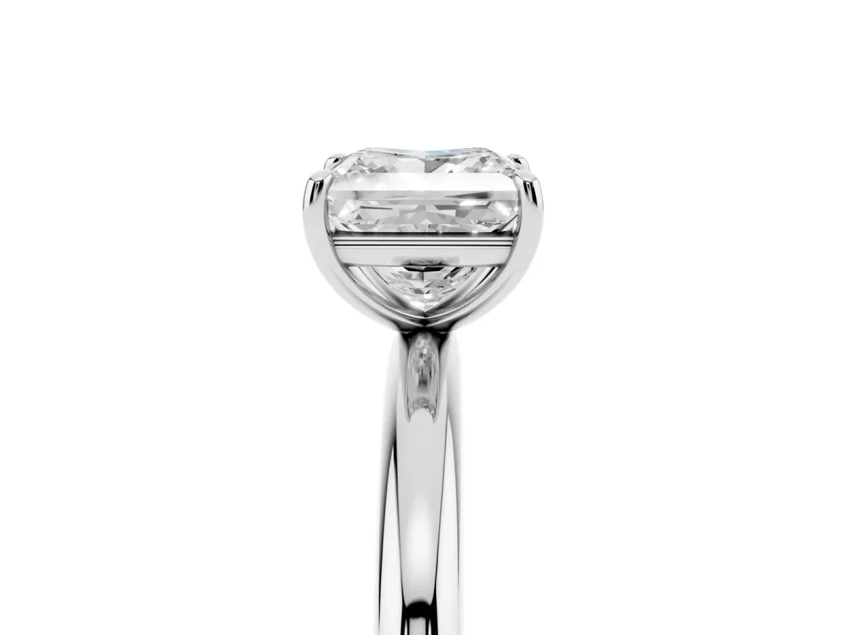 Princess Cut Solitaire Diamond Ring with Four-Prong Setting on a Plain Band Platinum