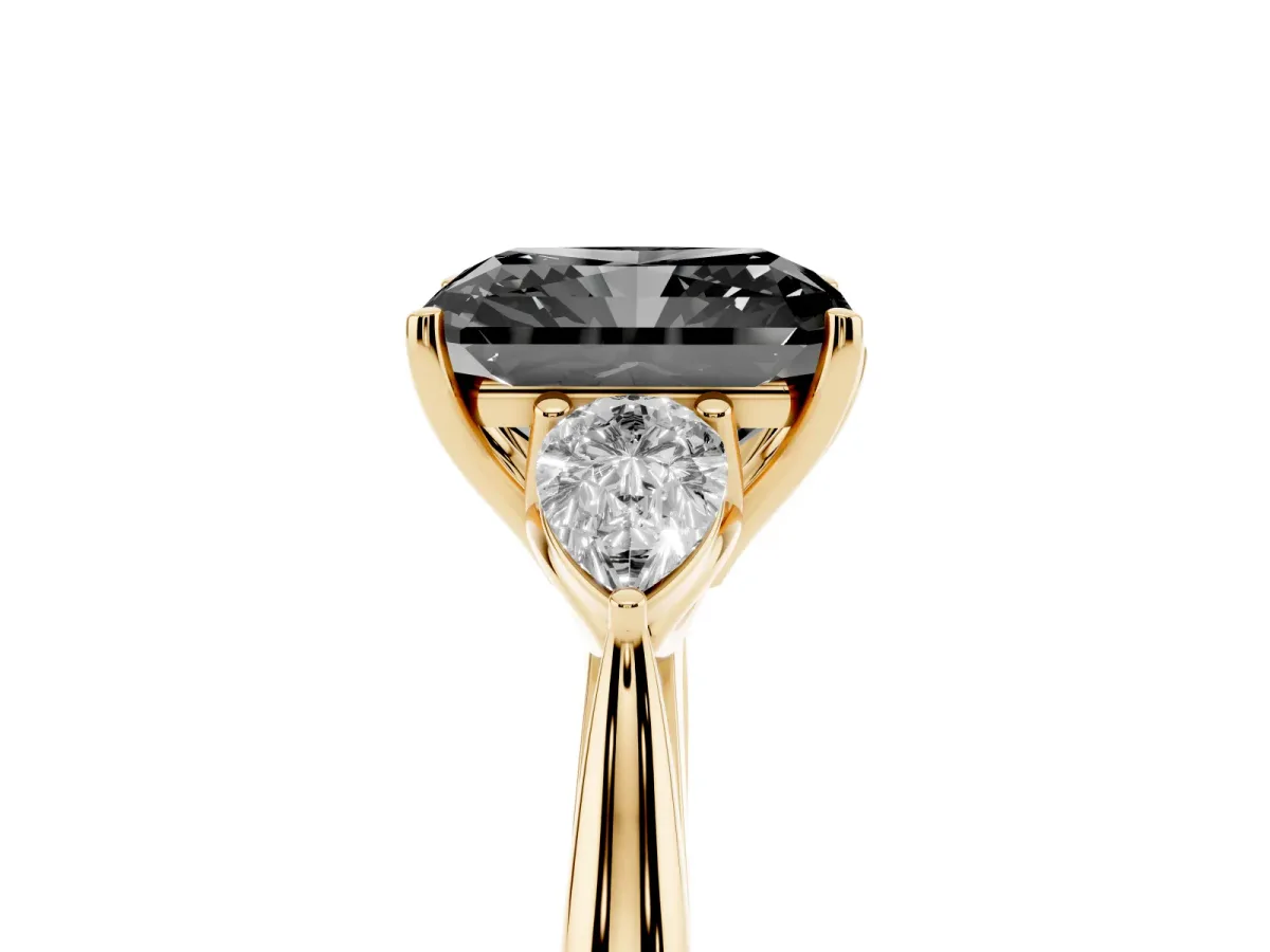 Fancy Black Radiant Cut Diamond Three-Stone Ring with Pear Side Stones and Prong Setting Yellow gold