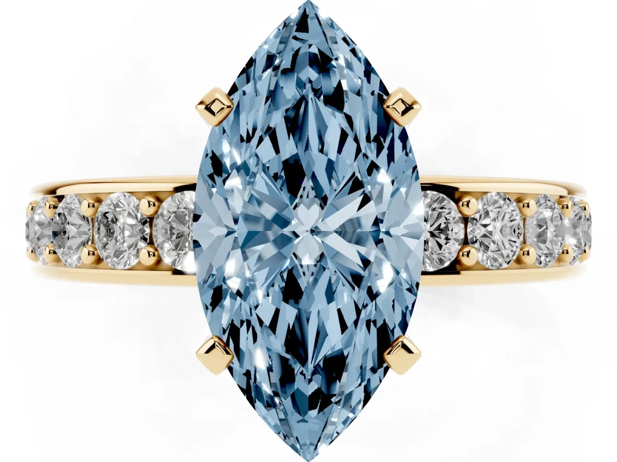 Fancy Blue Marquise Cut Diamond Engagement Ring with Channel Set Round Band and Prong Setting Yellow gold