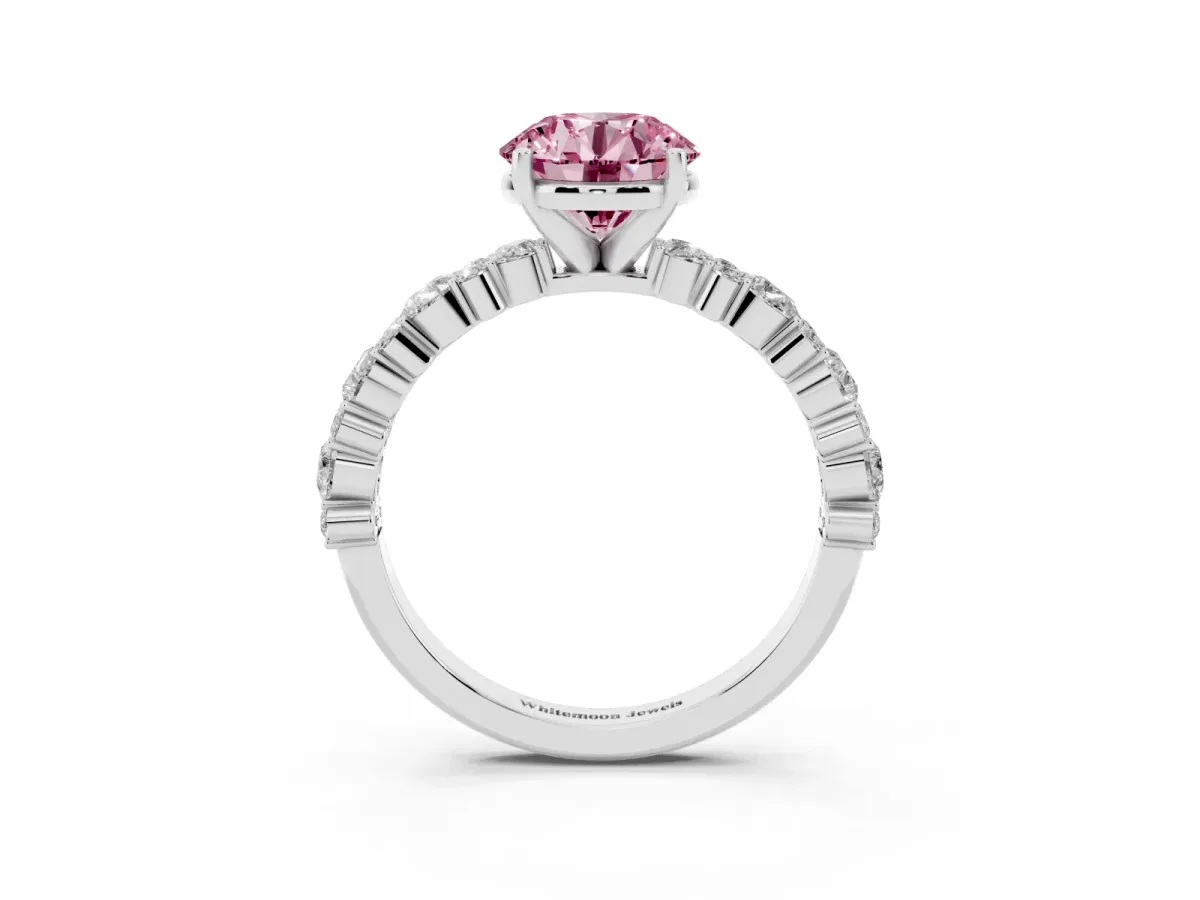 Fancy Pink Round Cut Diamond Side Stone Solitaire Ring with Round and Four-Prong Setting Platinum