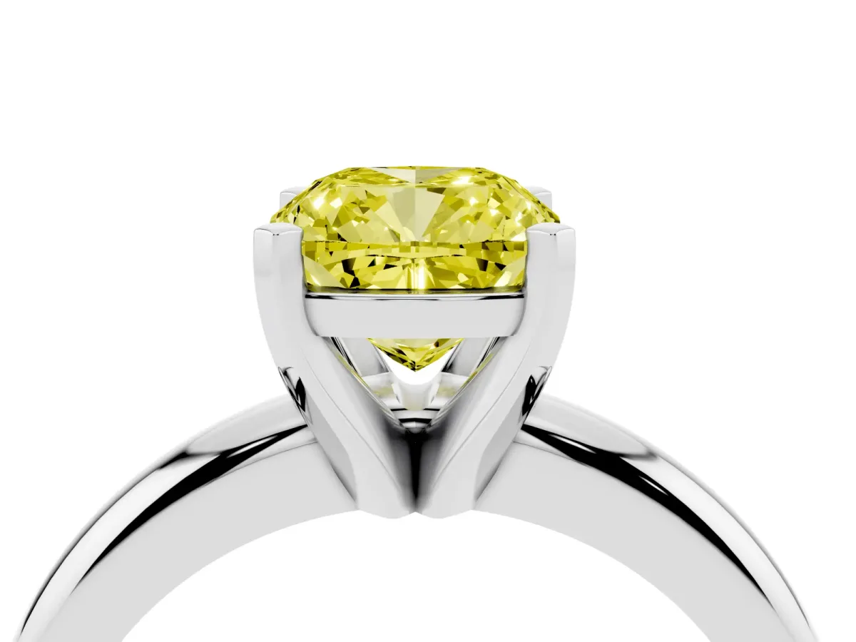 Fancy Yellow Cushion Cut Diamond Solitaire Engagement Ring with Round Band and Four-Prong Setting Platinum