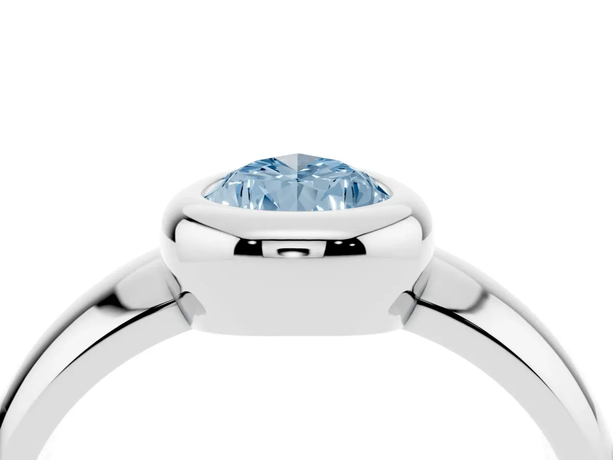 Fancy Blue Bezel Set Pear Cut Solitaire Ring with Wide Band Silver