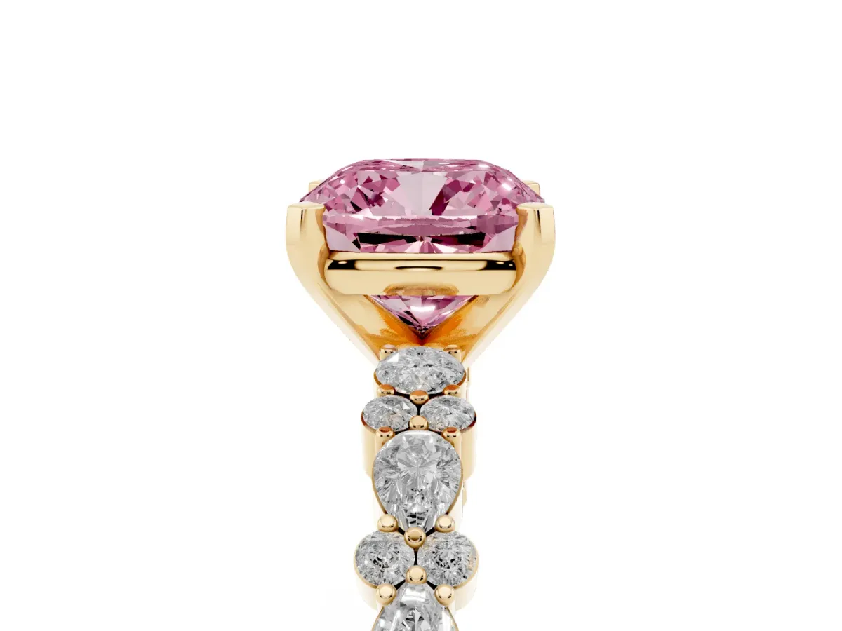 Fancy Pink Cushion Cut Diamond Side Stone Solitaire Ring with Round and Four-Prong Setting Yellow gold
