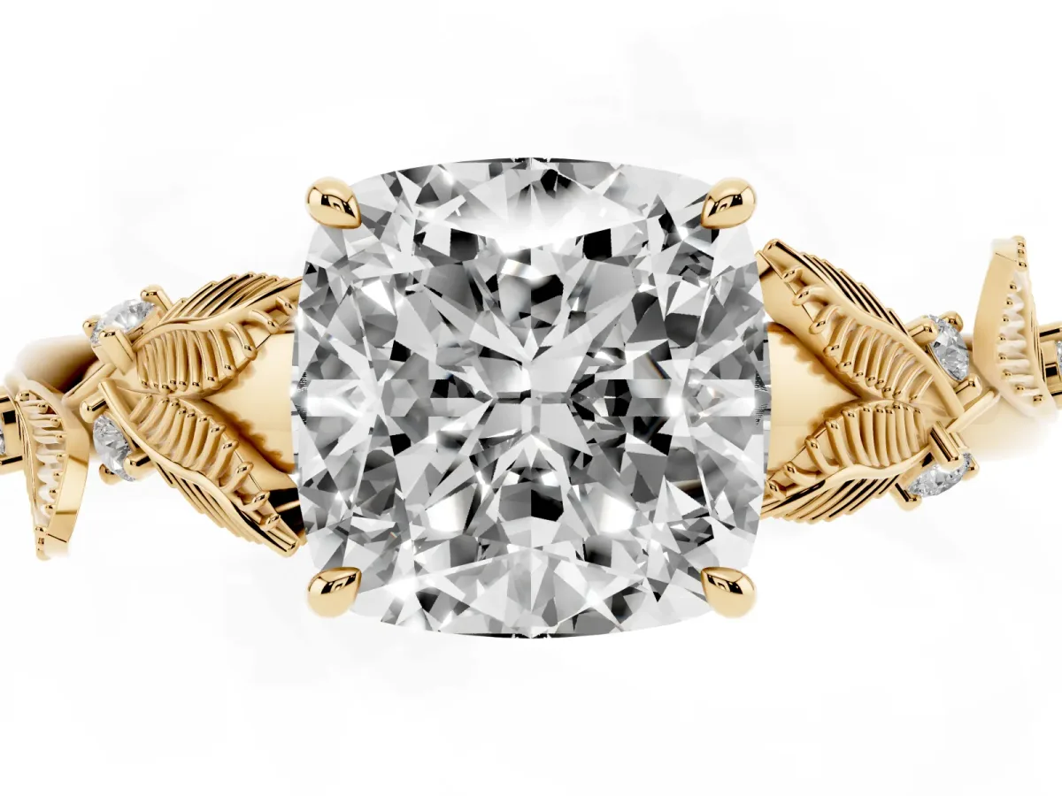 Cushion Cut Diamond Solitaire Ring with Leaf Motif Band and Four-Prong Setting Yellow gold