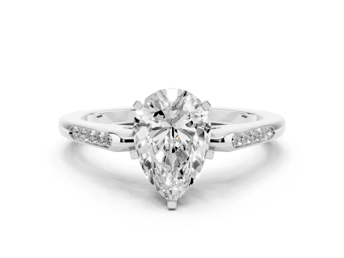 Pear Cut Diamond Solitaire Ring with Channel Set Round Band and Prong Setting Silver