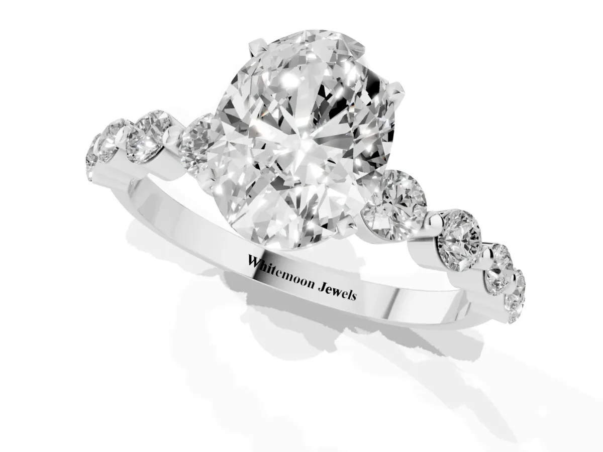 Oval Cut Solitaire Diamond Ring with Pave Band and Four-Prong Setting Silver