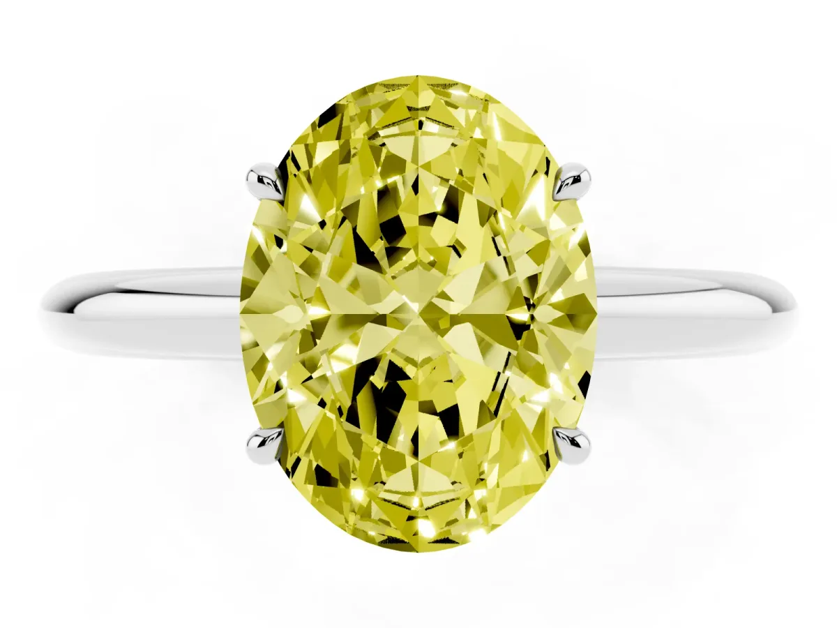 Fancy Yellow Oval Cut Brilliant Solitaire Engagement Ring with Six-Prong Setting and Classic Band Silver