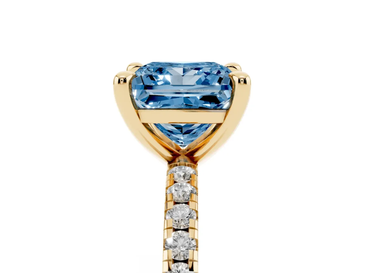 Fancy Blue Princess Cut Diamond Brilliant Solitaire Ring with Pavé Band and Four-Prong Setting Yellow gold
