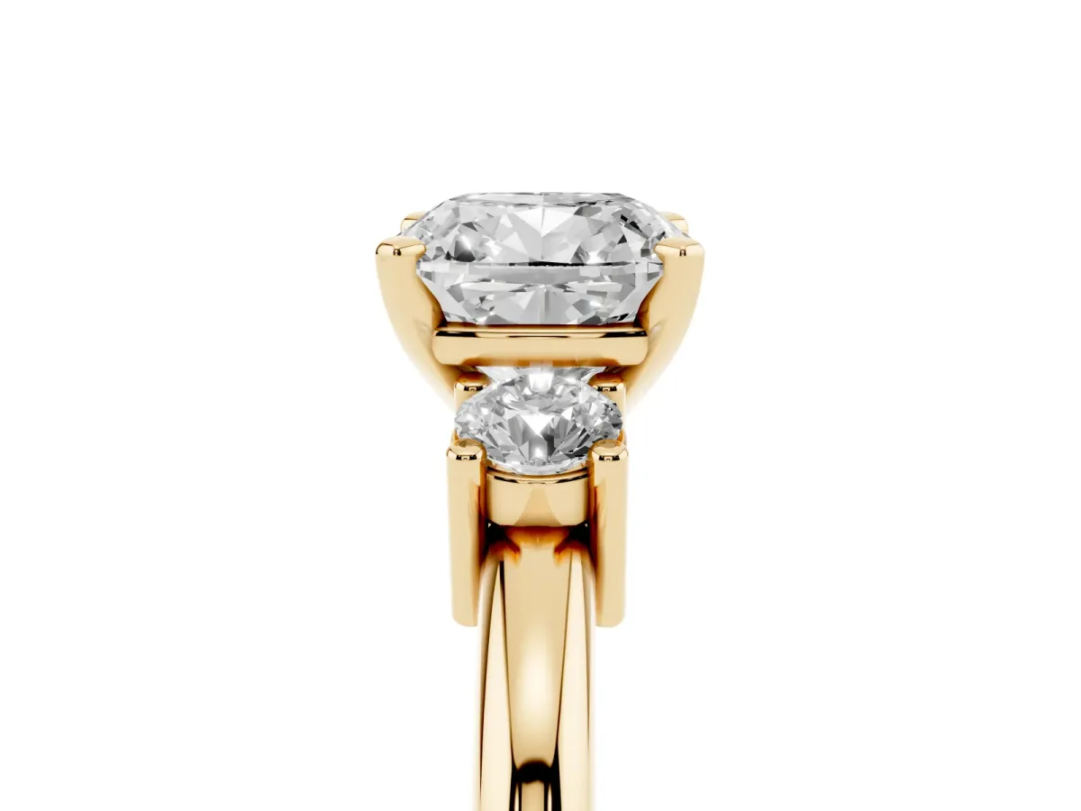 Three-Stone Cushion Cut Cut Diamond Solitaire with Prong Setting and Classic Band Yellow gold