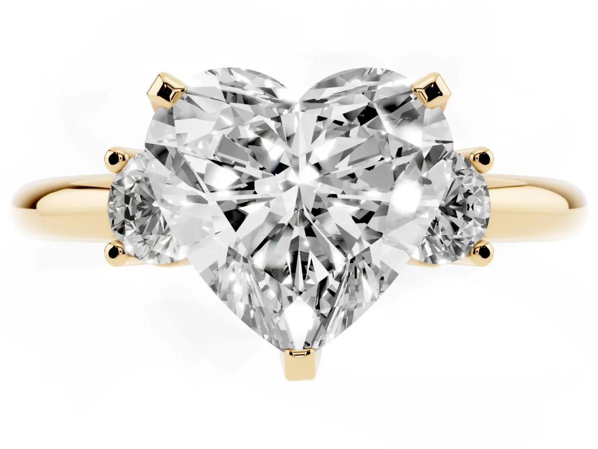 Three-Stone Heart Cut Cut Diamond Solitaire with Prong Setting and Classic Band Yellow gold