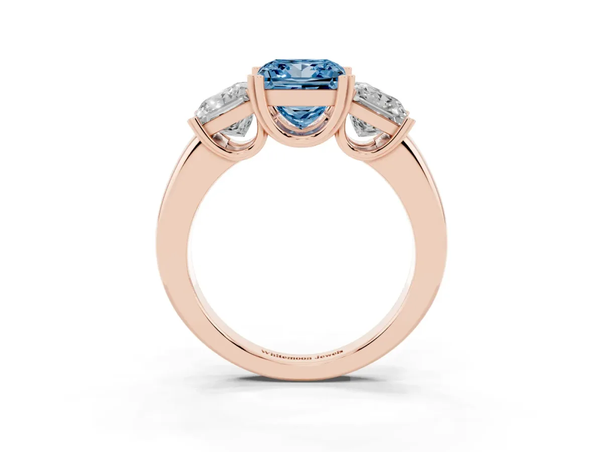 Fancy Blue Three-Stone Princess Cut Cut Diamond Ring with Channel Set Band and Four-Prong Setting Rose gold