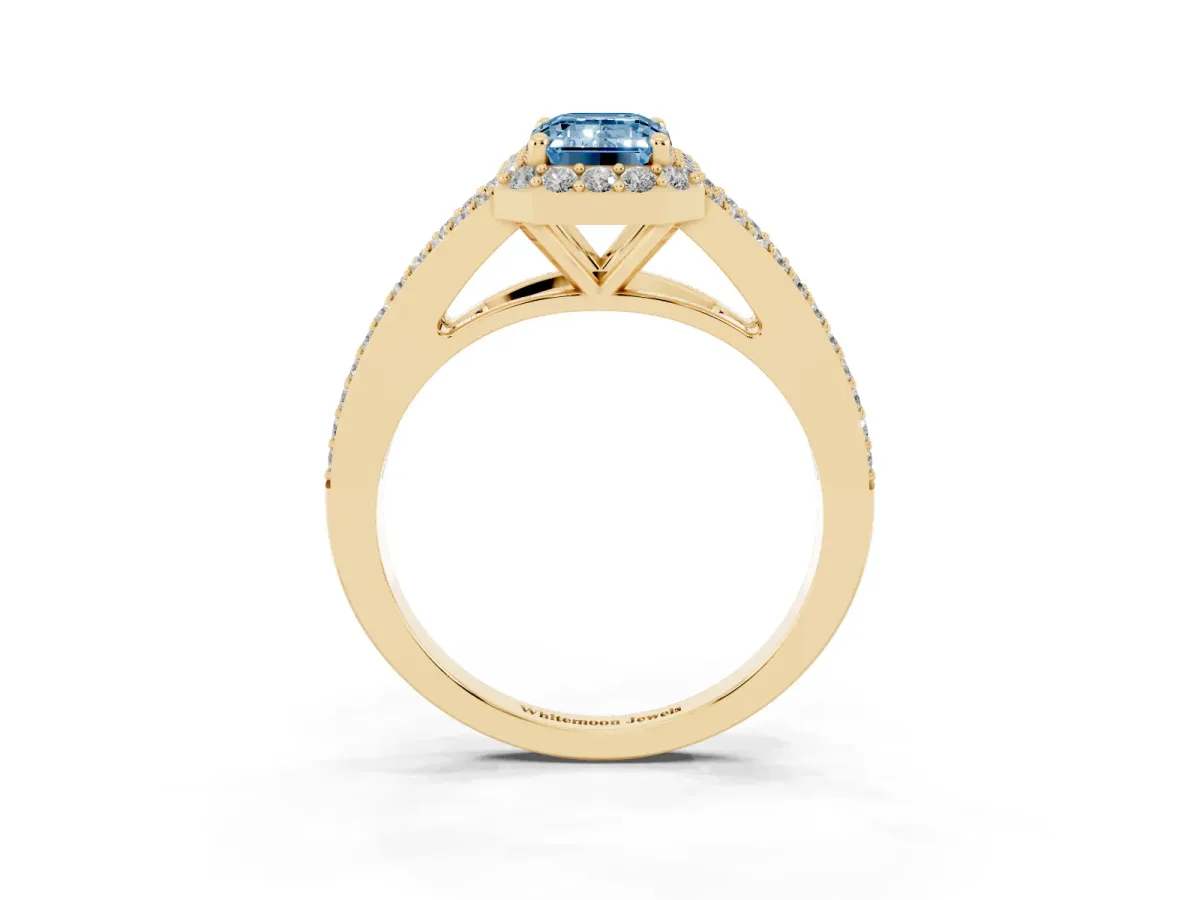 Fancy Blue Emerald Cut Halo Split Shank Diamond Ring with Prong Setting Yellow gold