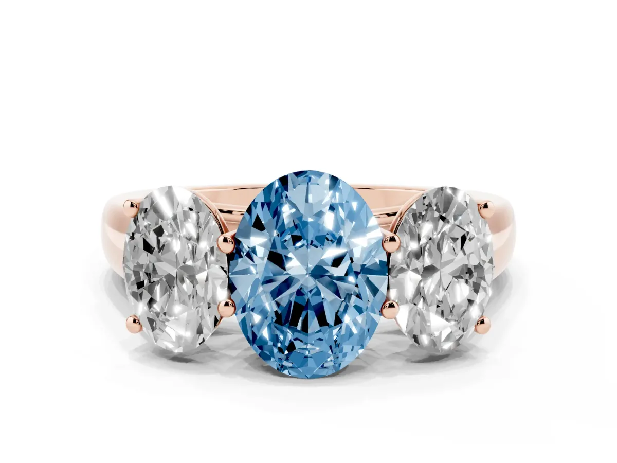 Fancy Blue Oval Cut Three-Stone Diamond Ring with Prong Setting on a Classic Band Rose gold