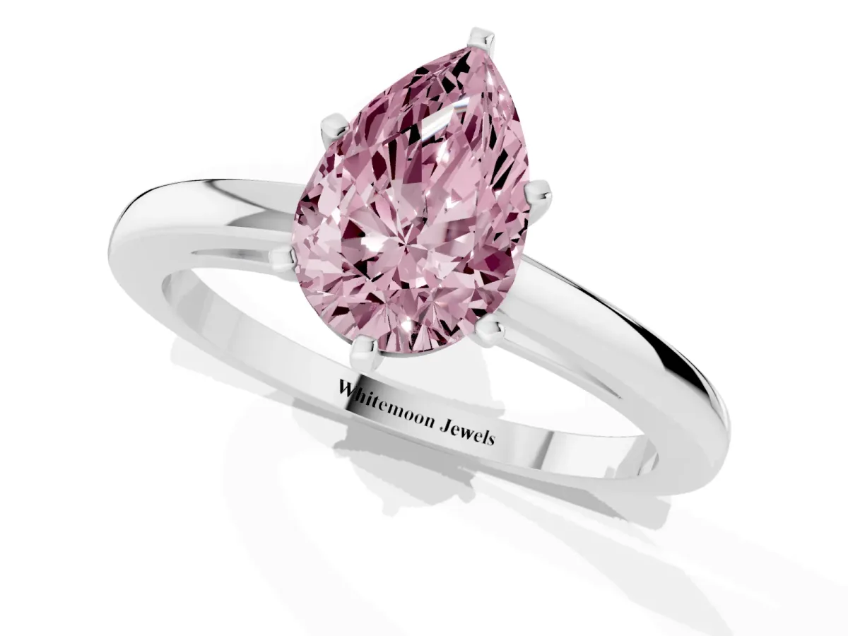 Fancy Pink Pear Cut Solitaire Diamond Engagement Ring with Four-Prong Setting on a Classic Band Platinum