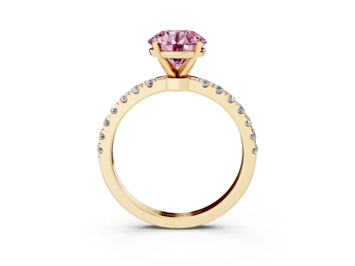 Fancy Pink Round Cut Diamond Solitaire Ring with Pavé Accents and Four-Prong Setting Yellow gold