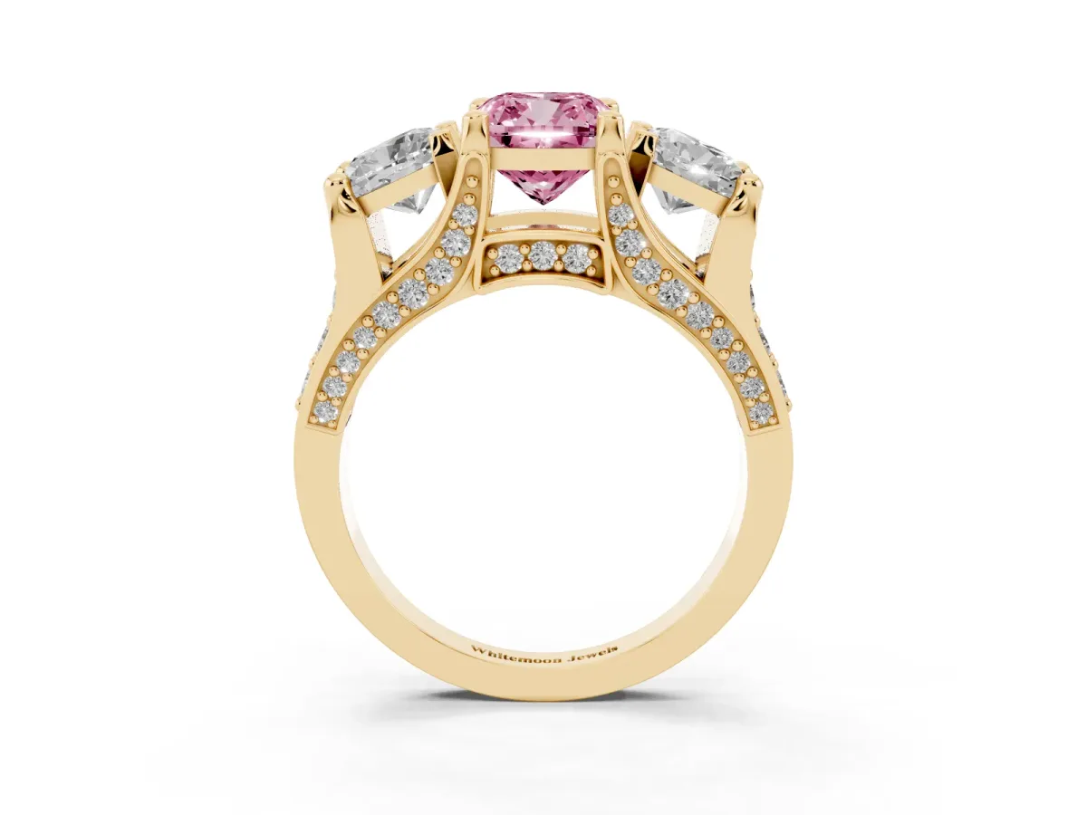 Fancy Pink Cushion Cut Diamond Three-Stone Ring with Channel Set Band and Four-Prong Setting Yellow gold