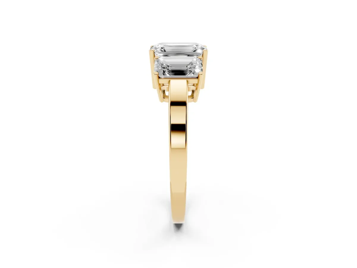 Three-Stone Emerald Cut Cut Diamond Engagement Ring with Flat Band and Four-Prong Setting Yellow gold