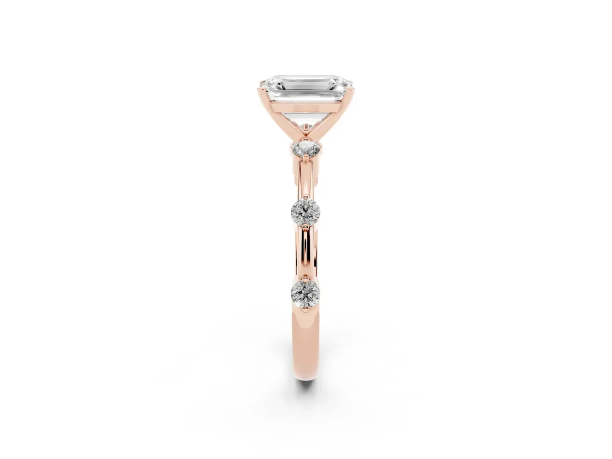 Emerald Cut Solitaire Diamond Ring with Bezel Set Side Stones and Prong Setting Rose gold