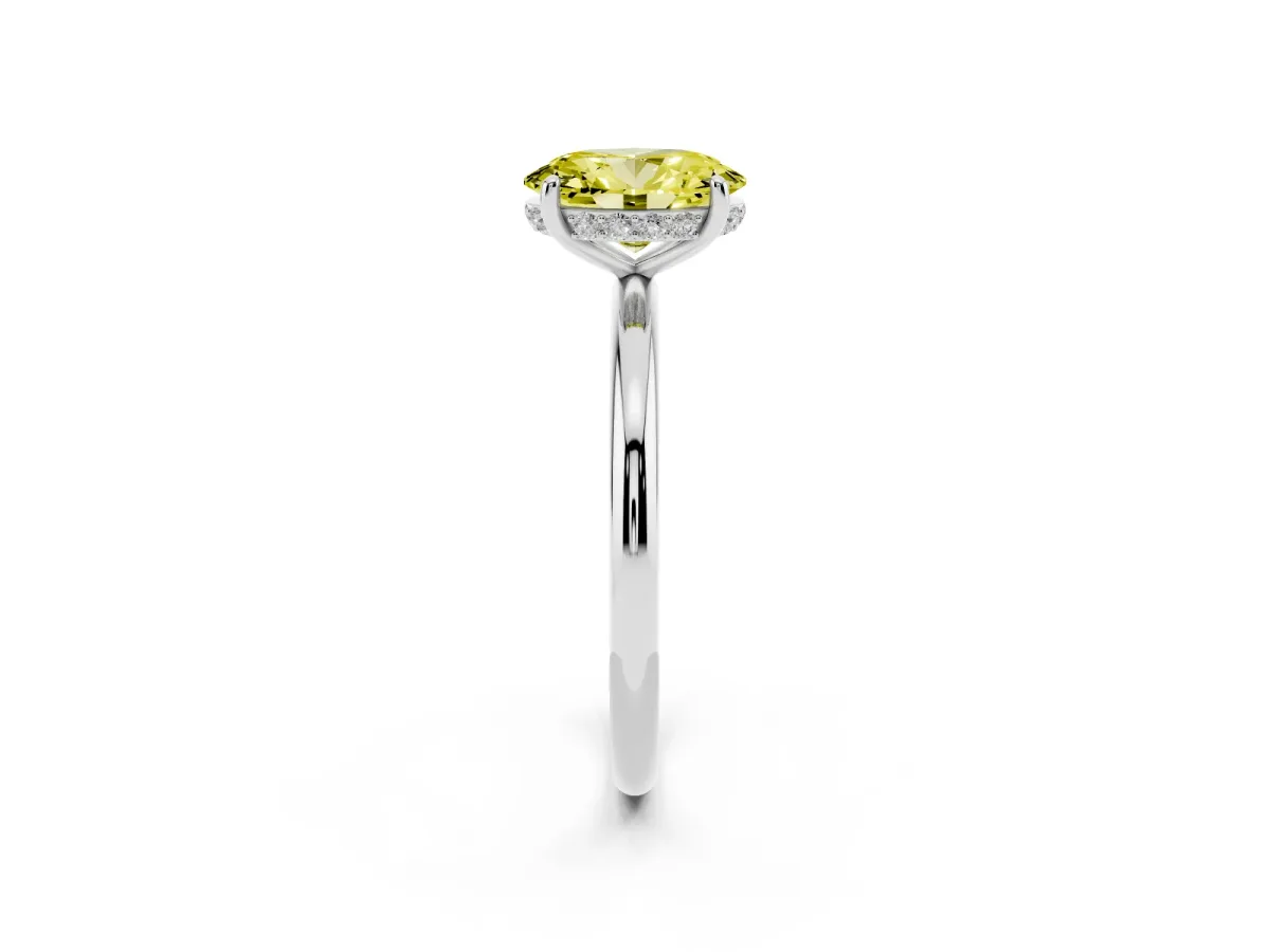 Fancy Yellow Oval Cut Solitaire Diamond Ring with a Classic Band and Four-Prong Setting Silver