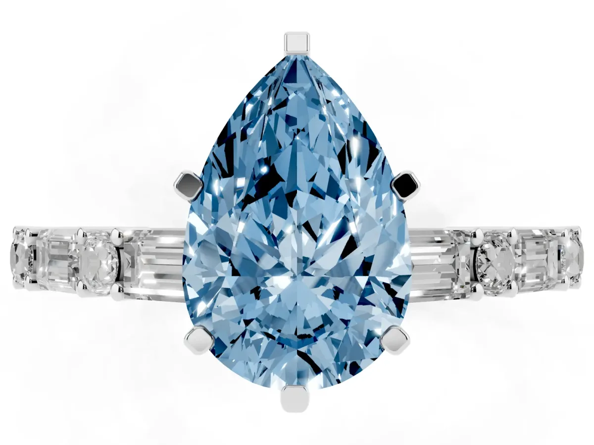 Fancy Blue Pear Cut Diamond Solitaire with Side Baguettes and Channel Set Band Silver