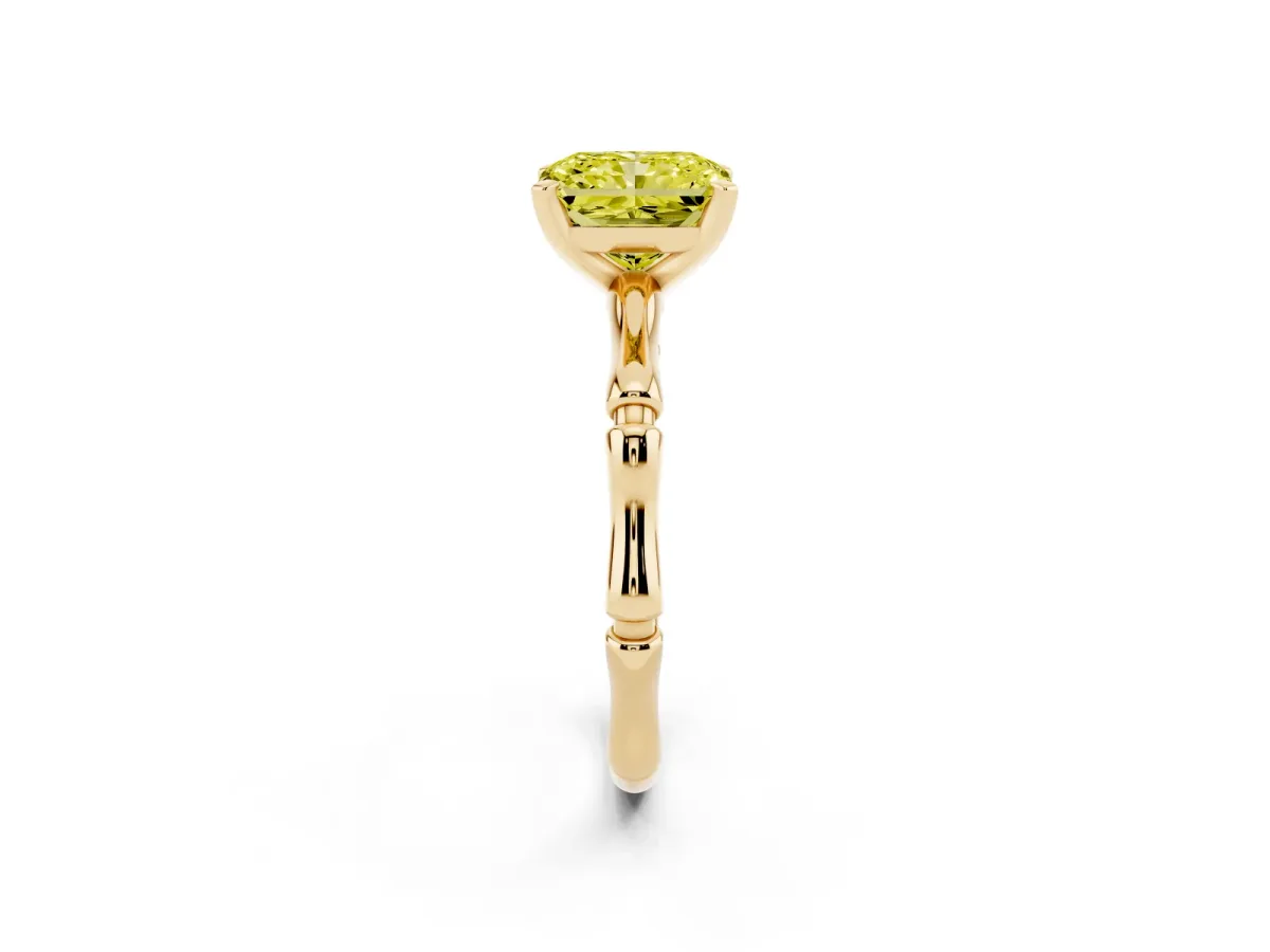 Fancy Yellow Radiant Cut Solitaire Diamond Ring with Bamboo Band and Four-Prong Setting Yellow gold