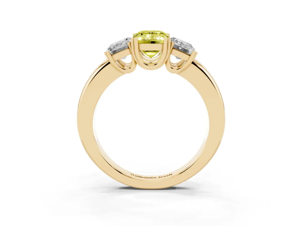 Fancy Yellow Three-Stone Emerald Cut Cut Diamond Ring with Channel Set Band and Four-Prong Setting Yellow gold