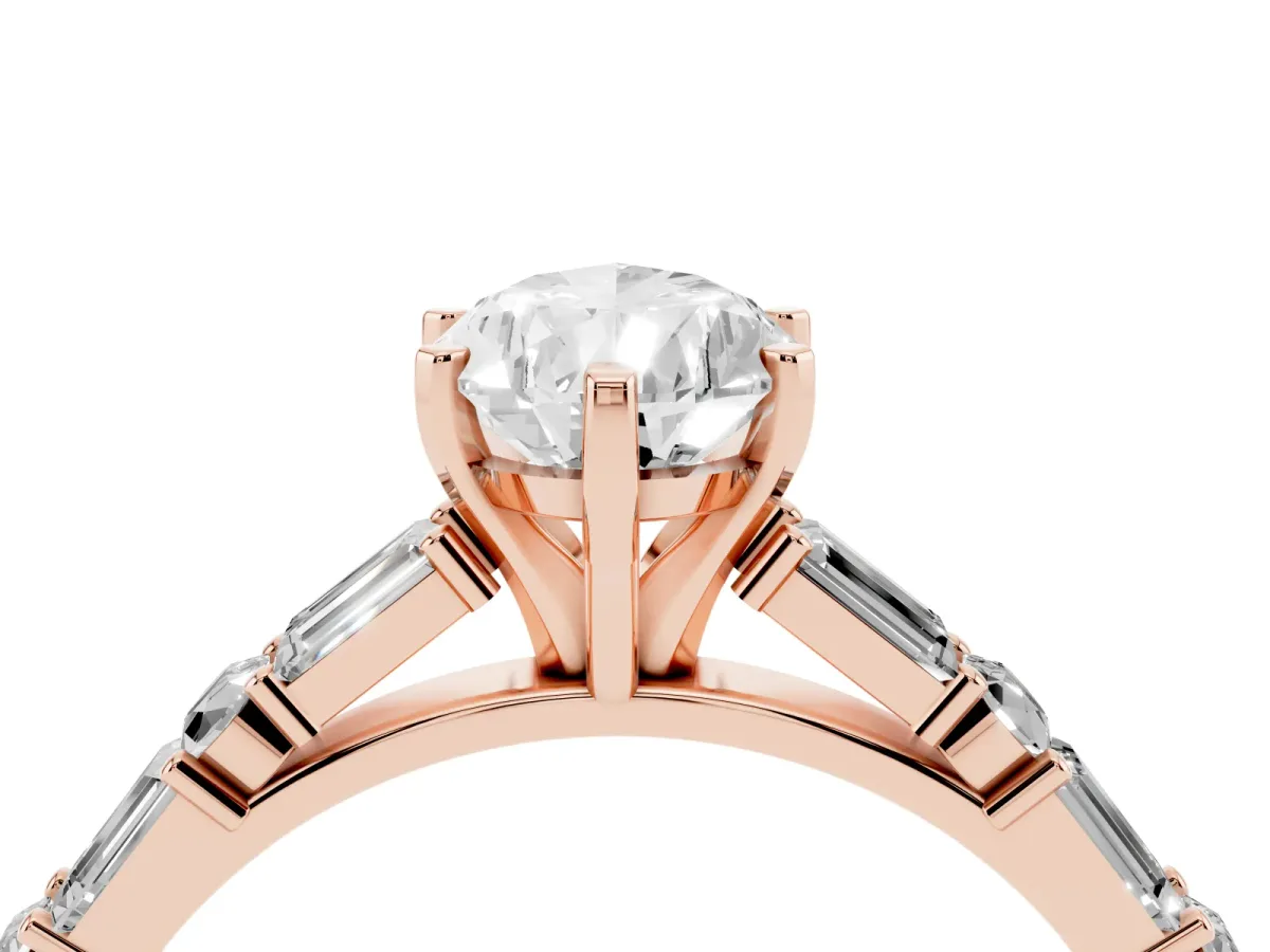 Pear Cut Diamond Solitaire with Side Baguettes and Channel Set Band Rose gold
